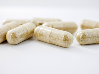 Herbal medicine capsule isolated on white background, Close-up of Herbal medicine capsule