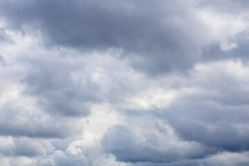 Dramatic overcast sky with thick gray clouds at daytime