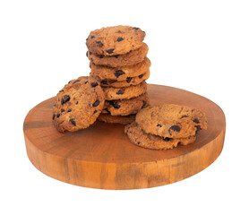 stack of chocolate chip cookies on a wooden plate