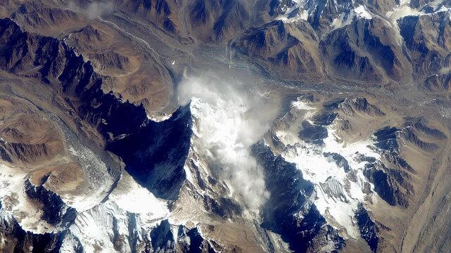 Karakoram Anomaly appears swirling vortex light energy, dancing across above rugged peaks.