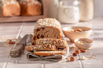 Homemade delicacies bread with bran, nuts and raisins.