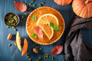 Sweet pumpkin tart made of fruits and cream.