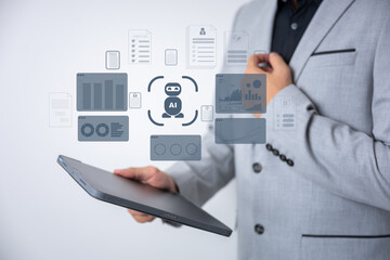 The Business man using AI robots to help analyze and increase efficiency in business