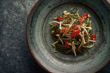 Kombu salad with boiled corn and green onions.