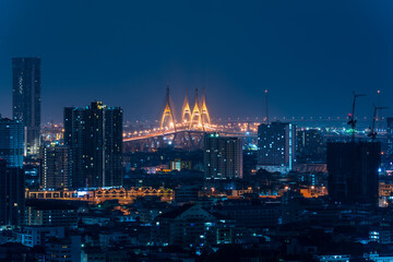 Bangkok City view with Bhumibol Bridge at night.