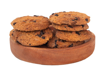 pile of delicious chocolate chip cookies on a wooden plate