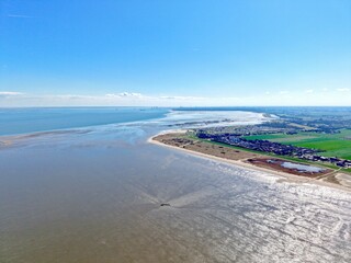 Luftbild von Schillig am Nationalpark Wattenmeer, Jade-Weser-Port im Hintergrund, Horumersiel, Wangerland, Friesland, Ostfriesland, Niedersachsen, Deutschland