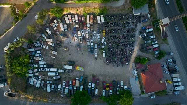 
a parking lot of scrap and unused vehicles 4 K