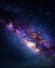 Fototapeta premium Night sky image showing the Milky Way galaxy with vibrant purple blue and yellow hues countless stars