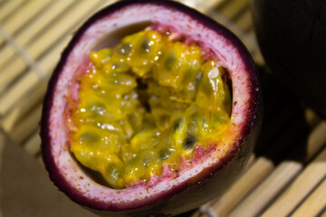 Freshly Cut Passion Fruit Half Revealing Juicy Vibrant Pulp and Seeds