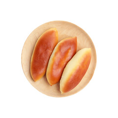 Three fresh bread rolls on a wooden plate, a simple, delicious treat perfect for breakfast