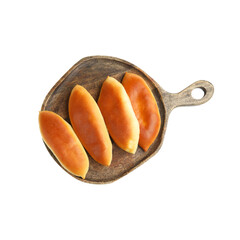 Four bread buns on a wooden cutting board, viewed from above. Each bun has a glossy golden-brown...