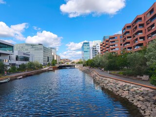 Beautiful architecture with a river flowing between buildings, urban landscape with water...