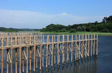Portugal, Caldas de Rainha, Panoramic view of the Lagoa de Obidos or Obidos Lagoon with its recently restored stilt pier and bird observatory. 