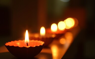 Diwali oil lamps in a glowing pathway. High quality