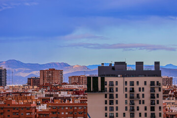 Houses of the Spanish town against the backdrop of mountains	
