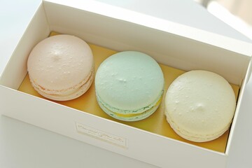 Colorful macarons arranged beautifully in a pastry box during a dessert display event