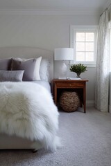 An inviting bedroom, with a cozy atmosphere, is meticulously presented in a realistic photograph that displays the elegance of interior design.