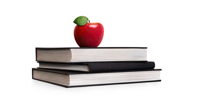 A pile of 3 books for going back to school with a red apple for the teacher or for the child as a healthy snack during their lesson to further their education isolated against a transparent background