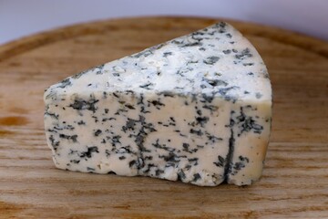 Dorblu Cheese on Wooden Board as the Perfect Component for Gourmet Compositions and Stylish Cheese-Focused Content