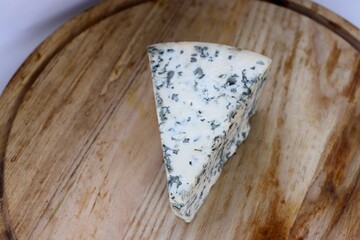 Dorblu Cheese on Wooden Board as the Perfect Component for Gourmet Compositions and Stylish Cheese-Focused Content