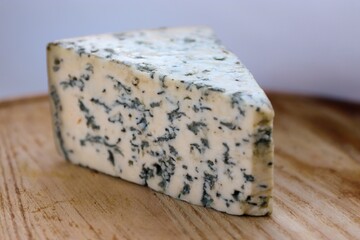 Dorblu Cheese on Wooden Board as the Perfect Component for Gourmet Compositions and Stylish Cheese-Focused Content