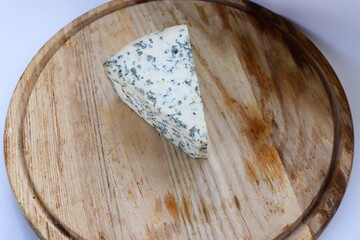 Dorblu Cheese on Wooden Board as the Perfect Component for Gourmet Compositions and Stylish...