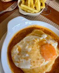 Typical Portuguese food. Portuguese francesinha sandwich