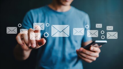 Person using a mobile phone to manage email, touching an email icon surrounded by gears, suggesting technology, communication, and modern online lifestyle engagement.
