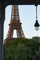 Paris Through the Arches: Iconic Eiffel Tower from Bir-Hakeim