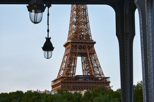 Framed by Steel: Eiffel Tower View from Bir-Hakeim Bridge