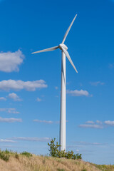 wind turbine on a blue sky