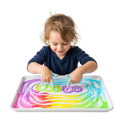 A young Caucasian boy with curly blond hair plays with colorful swirling patterns in a tray filled with vibrant, liquid colors. The background is transparent.