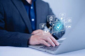Insurance and safety protection concept. Businessman show icon in front the laptop, Certification...