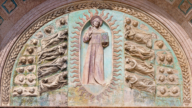 Perugia - The relief of St. Bernardine of Siena on the facade of church Oratorio dei Santi Andrea e Bernardino by Agostino di Duccio (1418 &ndash; 1481).