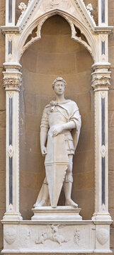 FLORENCE, ITALY - MARCH 17, 2025: The statue St. St. George on the facade of Orsanmichele by Donatello (1416).