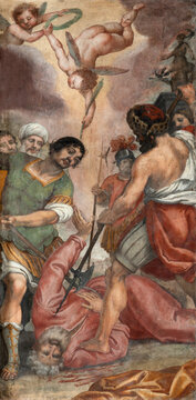 FLORENCE, ITALY - MARCH 18, 2025: The fresco Martyrdom of St. Jude Thaddeus the apostle in the chruch Chiesa di San Simone e Giuda by Nicodemo Ferrucci (1575 &ndash; 1650)