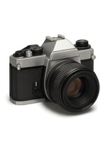 Vintage Camera: A classic vintage camera stands, ready to capture moments with its timeless design, showcasing the elegance of photographic technology.