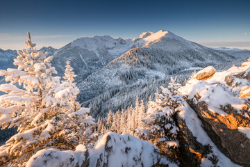 Snow-Covered Mountain Landscape at Sunrise