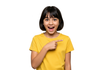 A cheerful asian girl pointing to the side isolated on transparent background, smiling with a happy and surprised expression while wearing a yellow shirt