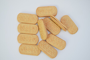 Filled cookies arranged on a white background.