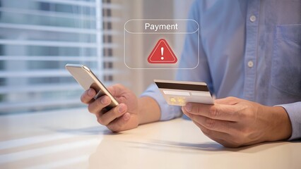Online Payment Security Alert: Man Using Smartphone and Credit Card, Warning Sign, Concerned Expression