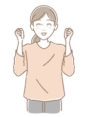 両手の拳をあげて応援する中高年女性