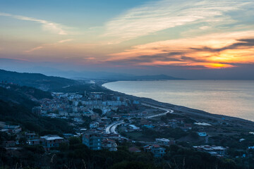 Small village with morning in state of Jijel, Algeria, rural village, A beautiful Mediterranean village in North Africa, Algeria from above, A small town overlooking the Mediterranean sea.