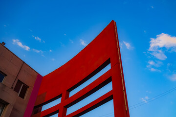 Geometric shapes of modern building facades with blue sky spaces