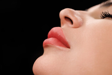 Focus on lips with refined shape and pigmentation after expert permanent makeup.
