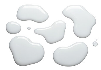 Several opaque white milk drops and puddles are isolated on transparent background