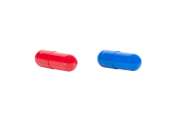 A red pill and a blue pill side by side, representing a difficult choice. A concept for a major decision, dilemma, and medicine, isolated on white background with clipping path.