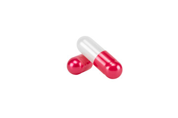 Two red and white antibiotic capsule pills. A pharmaceutical medicine for health treatment and wellness, isolated on white background with clipping path.