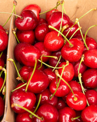 cherries in eco-friendly paper boxes for sale.